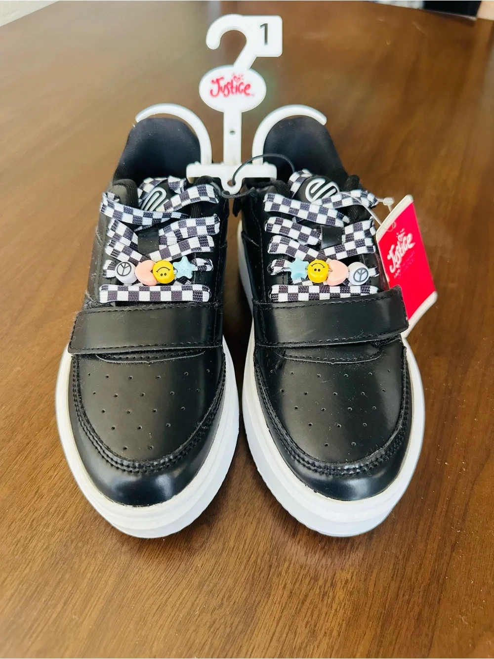 Justice Black Platform Sneakers with Checkerboard Laces and Colorful Charm